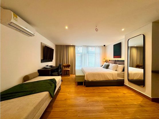 apartamento de lujo, elegancia, balcón, AIRBNB Laureles, rentas cortas, inversión.